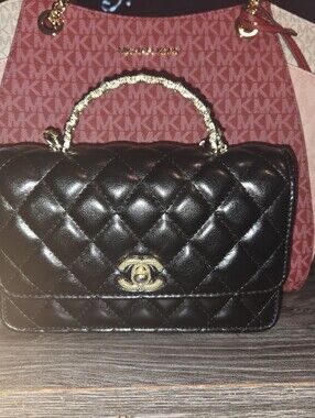 Black Quilted Leather Shoulder Bag with Gold Hardware